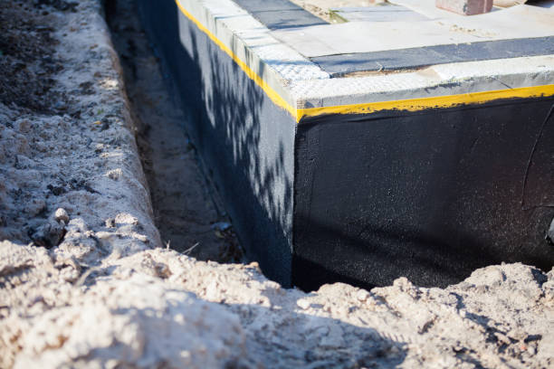 Professional Waterproofing technician working in Jonesville, VA
